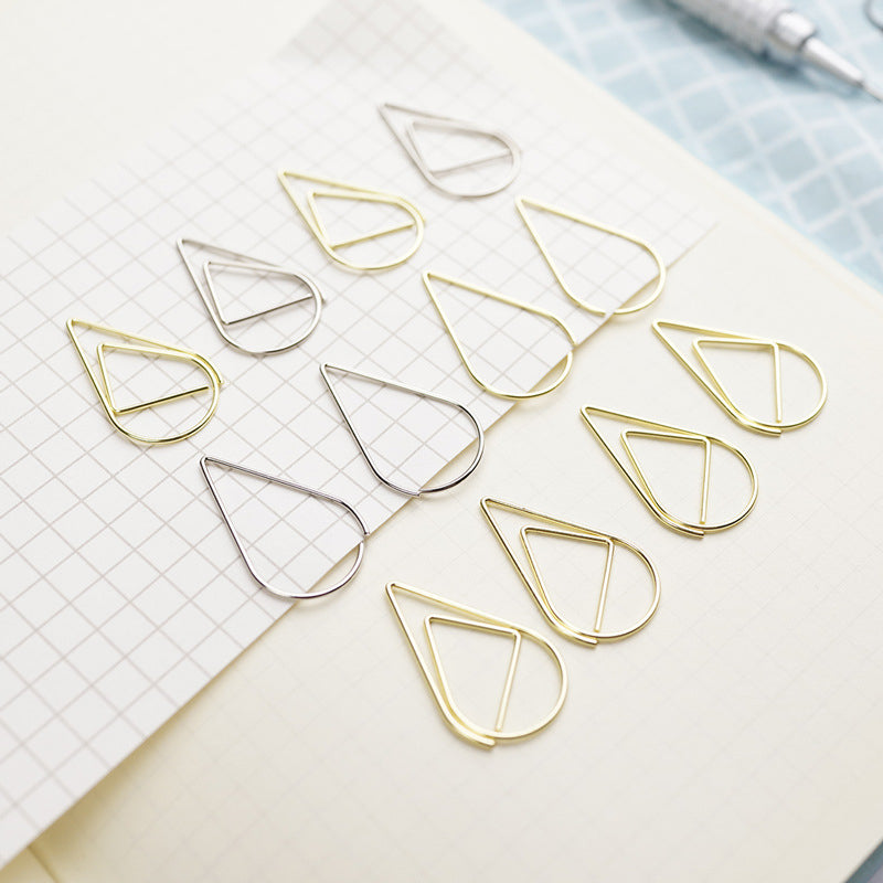 Clips de diseño en forma de lágrima en color oro y plata